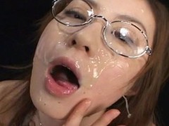 Kokoro Amano sucked dicks and took 150 bukkake cumshots on her face and in her face gap  ate cum on food and collected cum in a bottle and swallowed it all down.