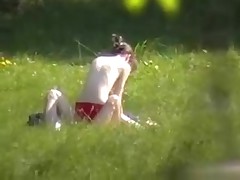 A creeper in the bushes catches a nude pair fucking in the park with his cam. Their nude bodies receive it on and enjoy their sex without a care in the world or the slightest suspicion that somebody may be lurking.