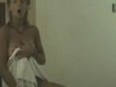 Lively chick looks so gorgeous after taking the shower! Her towel falls down and she stays nude previous to camera exposing perfect small boobs!